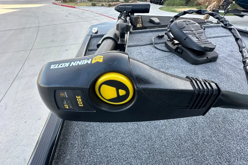 Slide: The Image of Minn Kota trolling motor on 2027 Tracker Bass Tracker Classic XL boat deck. - 62