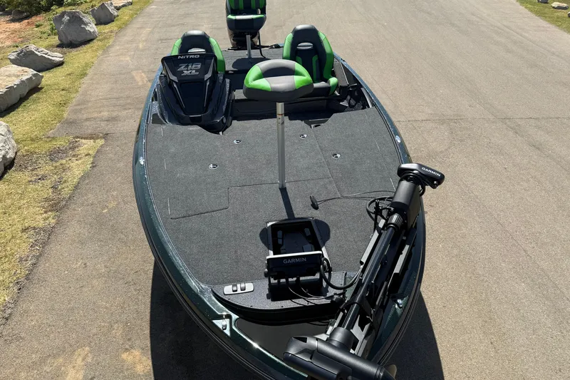Slide: The Image of 2027 Nitro Z18 XL Pro fishing boat with Garmin equipment on a paved road. - 21