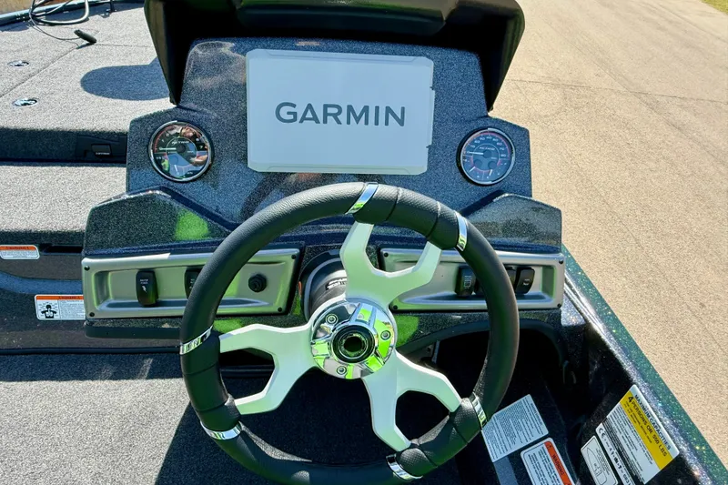 Slide: The Image of Steering wheel and dashboard of 2027 Nitro Z18 XL Pro boat with Garmin display. - 14