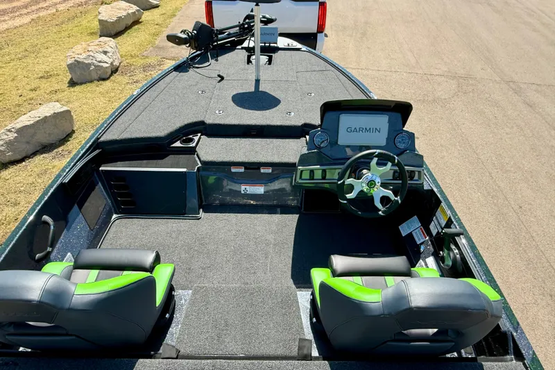 Slide: The Image of 2027 Nitro Z18 XL Pro boat interior with Garmin navigation, dual seats, and sleek dashboard design. - 13