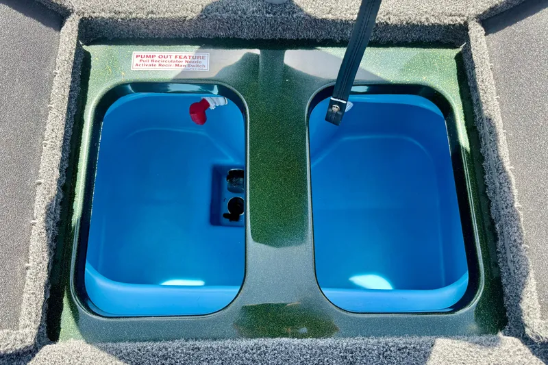 Slide: The Image of Livewell compartments in a 2027 Nitro Z18 XL Pro boat, featuring pump-out feature. - 24