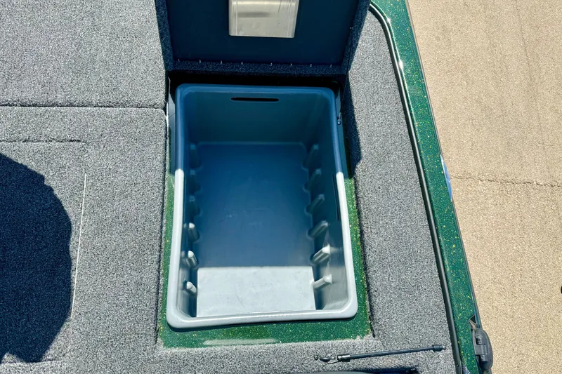 Slide: The Image of Open storage compartment on 2027 Nitro Z18 XL Pro boat deck. - 26
