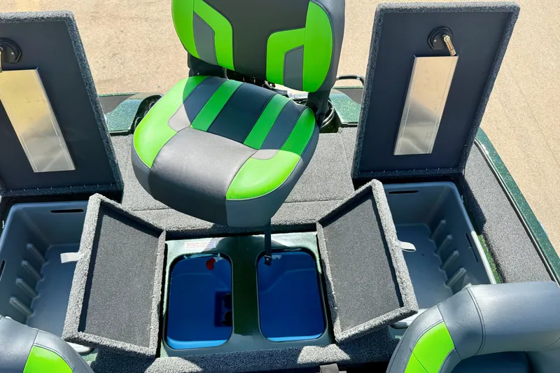 Slide: The Image of 2027 Nitro Z18 XL Pro boat interior with green and gray seating and storage compartments. - 22