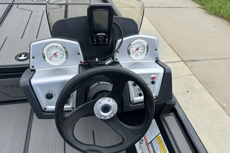 Slide: The Image of Steering console of 2027 Tracker Pro 170 boat with gauges and Garmin device. - 18