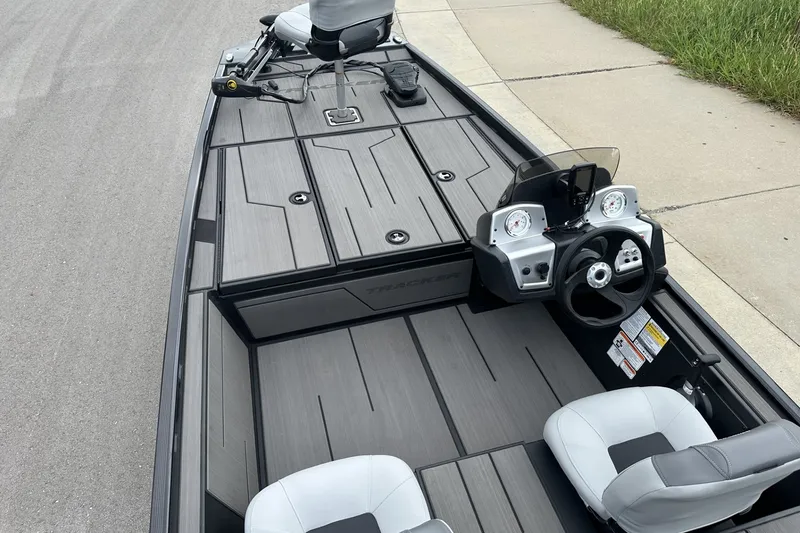 Slide: The Image of 2027 Tracker Pro 170 boat interior with modern dashboard and seating. - 19