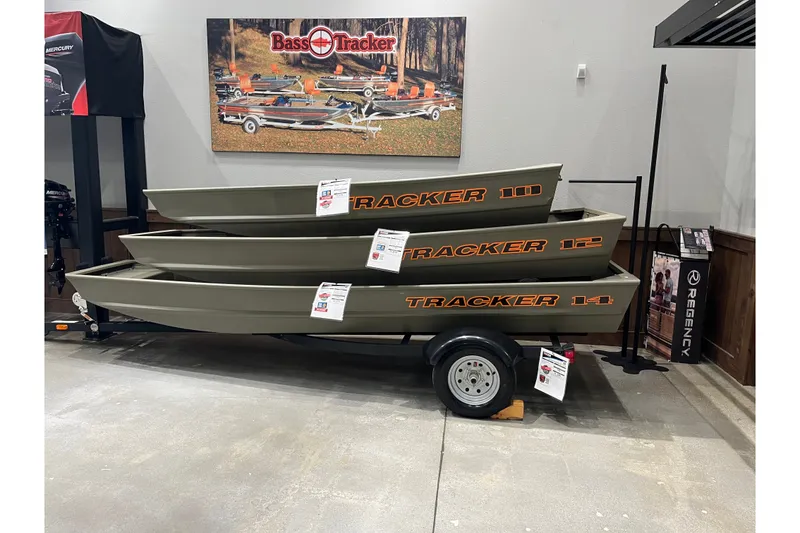 The Image of Stacked Tracker Grizzly 14 Jon boats on display, featuring 2027 models. - 0