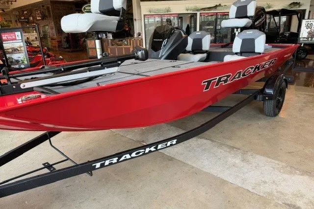 The Image of 2027 Tracker Pro 170 boat in showroom, red exterior, on trailer. - 0