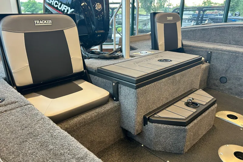 Slide: The Image of 2027 Tracker Pro Guide V-175 Combo boat interior with seating and storage compartments. - 54