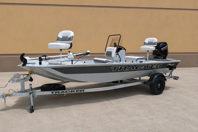 The Image of 2027 Tracker Bass Tracker Classic CC fishing boat on trailer, featuring Minn Kota motor. - 0