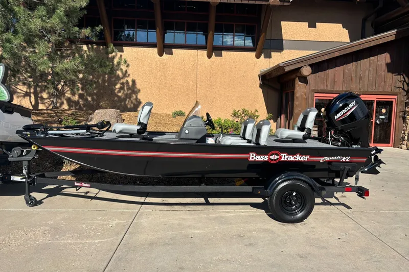 The Image of 2027 Tracker Bass Tracker Classic XL boat with Mercury engine on trailer. - 0