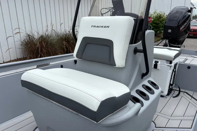 Slide: The Image of 2027 Tracker Bass Tracker Classic CC boat interior with white and gray seating. - 43