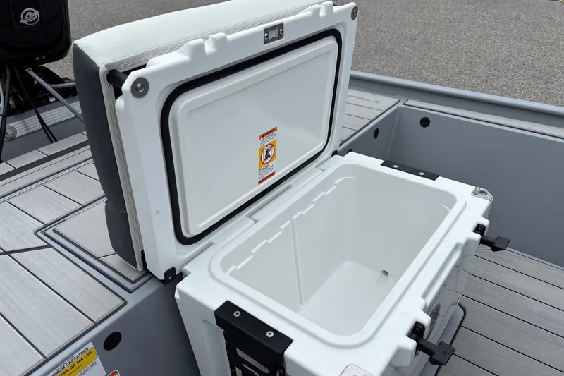 Slide: The Image of Open storage compartment on 2027 Tracker Bass Tracker Classic CC boat deck. - 42