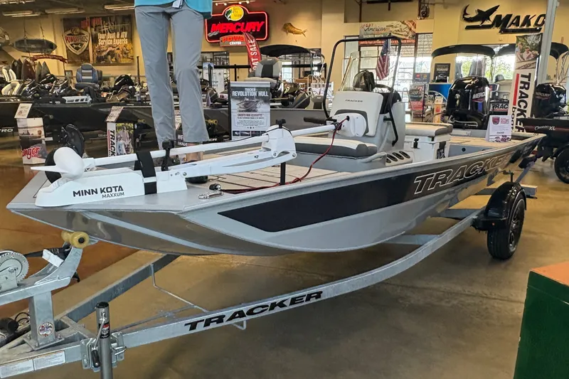 The Image of 2027 Tracker Bass Tracker Classic CC boat displayed in showroom with Minn Kota Maxxum motor. - 0