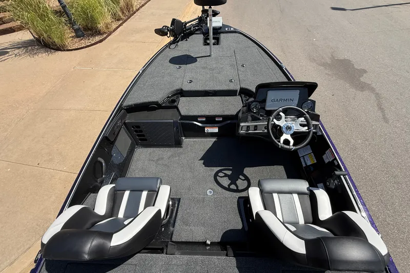 Slide: The Image of 2027 Nitro Z18 XL Pro boat interior with Garmin navigation system and dual seating. - 11