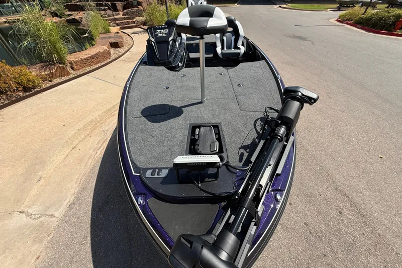 Slide: The Image of 2027 Nitro Z18 XL Pro boat with advanced Garmin equipment on a sunny day. - 4