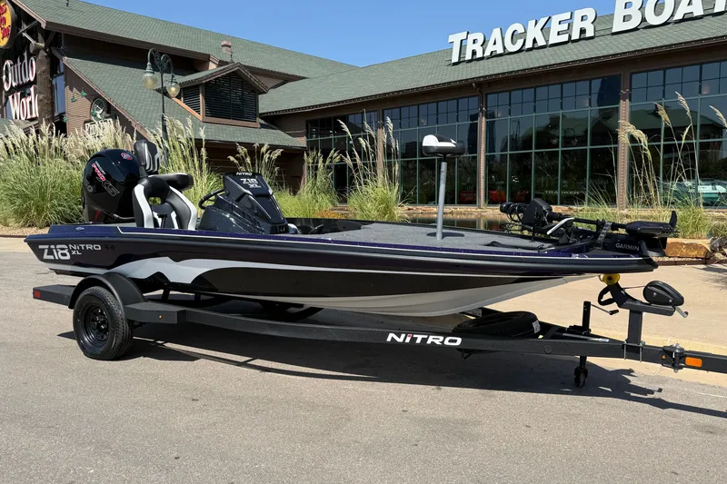 Slide: The Image of 2027 Nitro Z18 XL Pro boat displayed outside Tracker Boats store. - 8