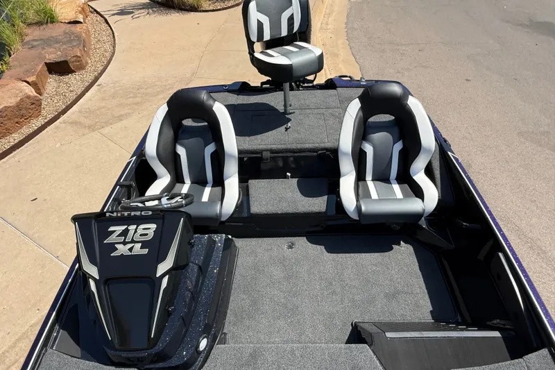 Slide: The Image of 2027 Nitro Z18 XL Pro boat interior with sleek seating and modern design. - 5