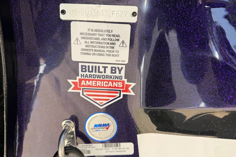 Slide: The Image of 2027 Nitro Z18 XL Pro boat with "Built by Hardworking Americans" sticker and safety instructions. - 14
