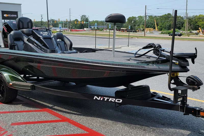 Slide: The Image of 2027 Nitro Z18 XL boat on trailer in parking lot. - 1