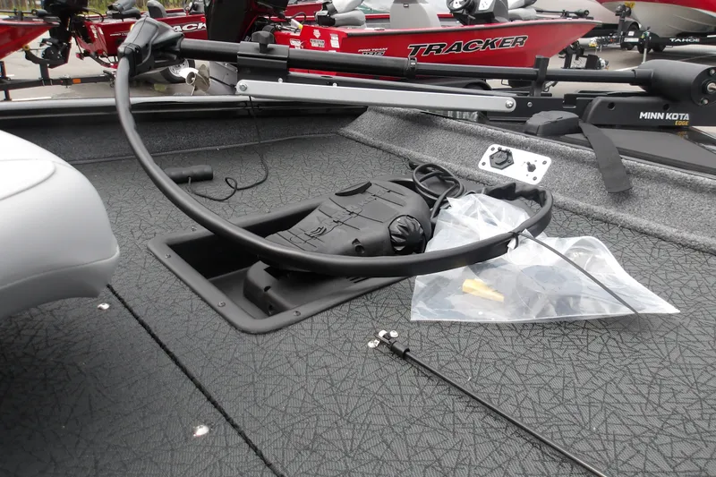 Slide: The Image of 2027 Tracker Pro Team 175 boat deck with Minn Kota trolling motor and accessories. - 17