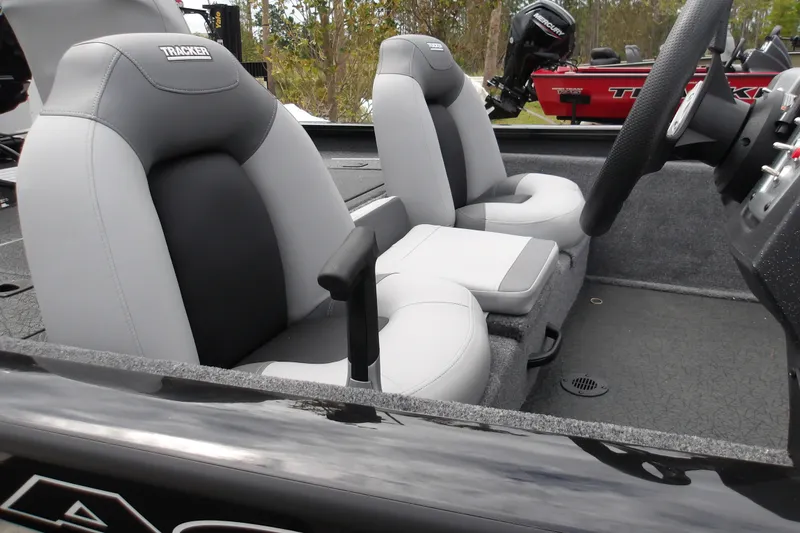 Slide: The Image of 2027 Tracker Pro Team 175 boat interior with gray and black seating. - 16