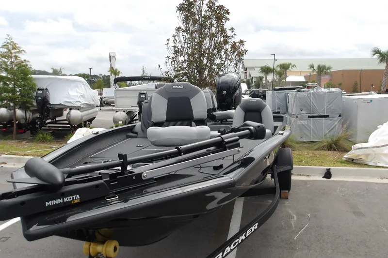 Slide: The Image of 2027 Tracker Pro Team 175 boat with Minn Kota Edge motor in outdoor setting. - 18