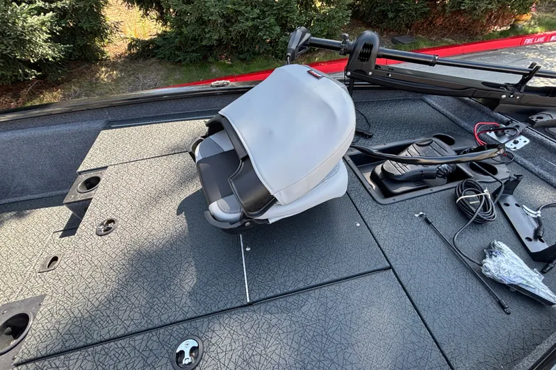 Slide: The Image of 2027 Tracker Pro Team 175 boat deck with seat and fishing equipment. - 27