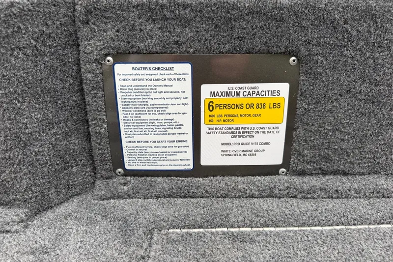 Slide: The Image of Boater's checklist and capacity plate on 2027 Tracker Pro Guide V-175 Combo boat. - 30