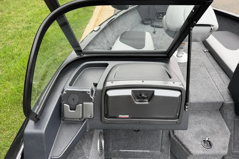 Slide: The Image of 2027 Tracker Pro Guide V-175 Combo boat interior with seating and storage compartments. - 19