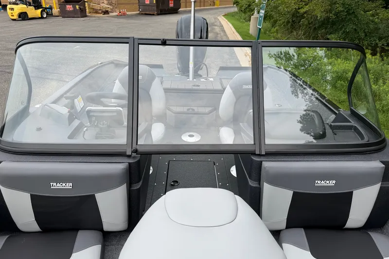 Slide: The Image of 2027 Tracker Pro Guide V-175 Combo boat interior with seating and windshield. - 23
