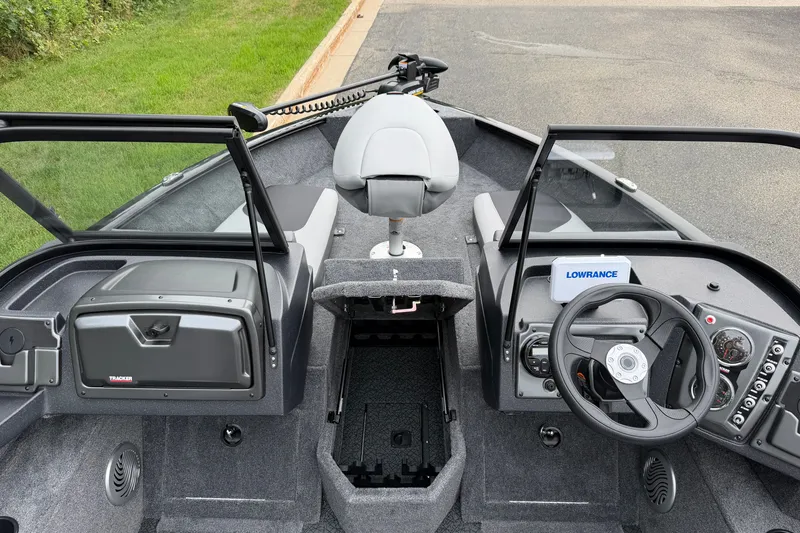 Slide: The Image of 2027 Tracker Pro Guide V-175 Combo boat interior with steering wheel and control panel. - 22