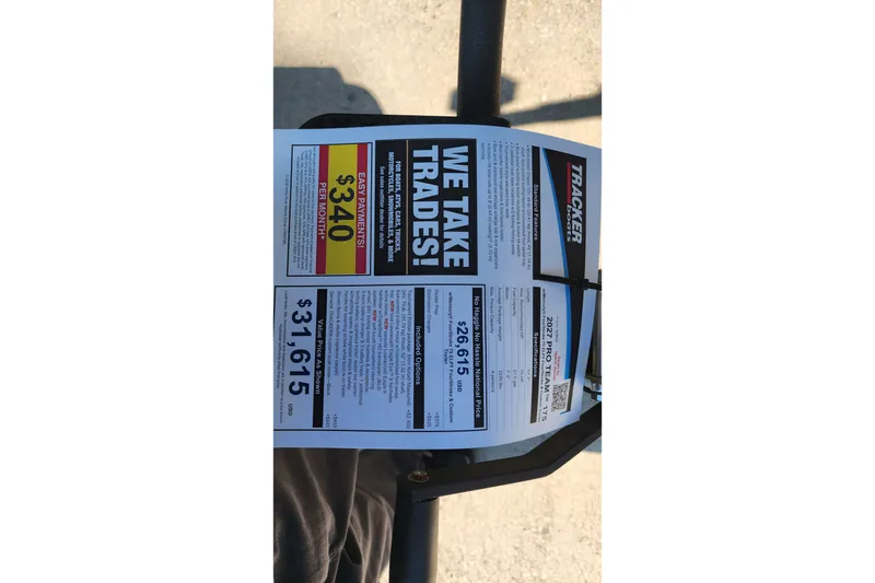 Slide: The Image of 2027 Tracker Pro Team 175 price sheet, highlighting trade options and monthly payment details. - 30