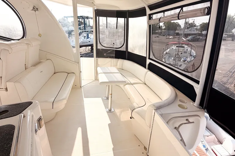 Slide: The Image of Luxurious interior of 2007 Cruisers Yachts 455 Express Motoryacht with plush seating and table. - 10