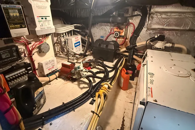 Slide: The Image of Engine room of 2007 Cruisers Yachts 455 Express Motoryacht with wiring and equipment. - 15
