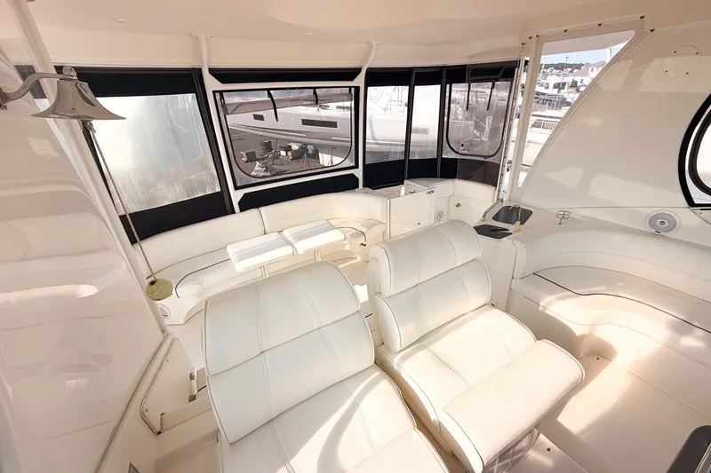 Slide: The Image of Luxurious interior of 2007 Cruisers Yachts 455 Express Motoryacht with plush white seating. - 8