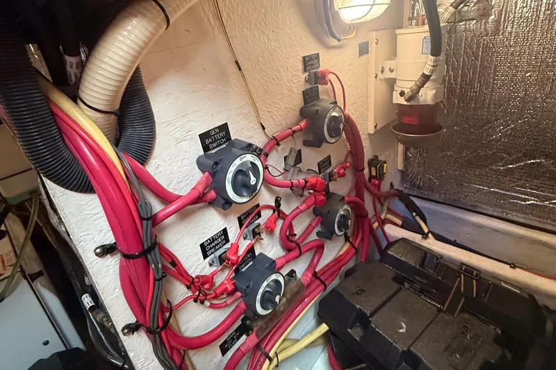 Slide: The Image of Electrical system of 2007 Cruisers Yachts 455 Express Motoryacht with battery switches and wiring. - 13