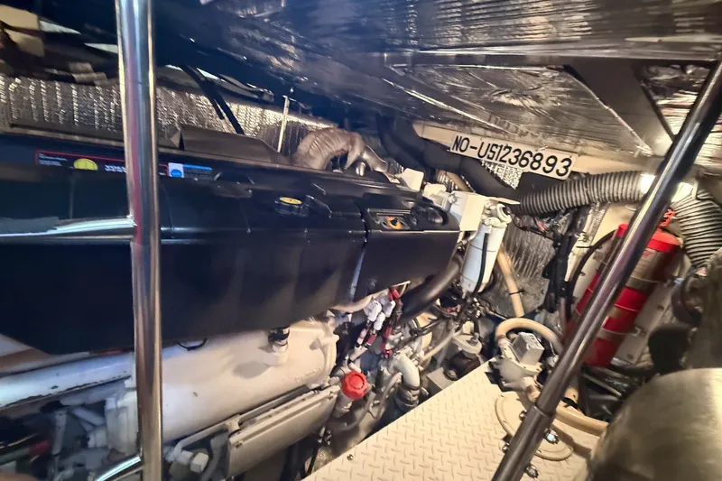 Slide: The Image of Engine room of 2007 Cruisers Yachts 455 Express Motoryacht, showcasing mechanical components. - 18