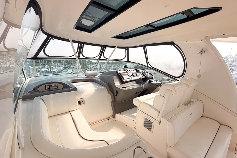 Slide: The Image of Luxurious interior of 2007 Cruisers Yachts 455 Express Motoryacht with plush seating and modern helm. - 6
