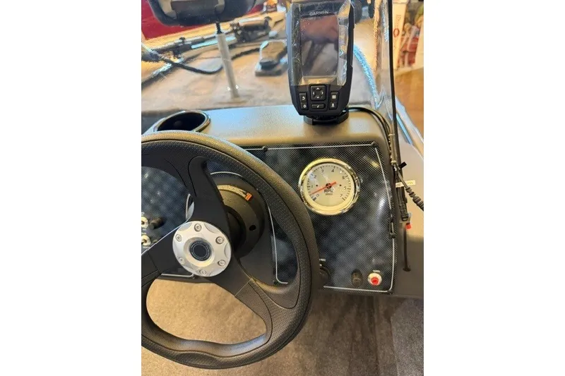 Slide: The Image of Steering console of 2027 Tracker Bass Tracker Classic XL with Garmin device. - 14