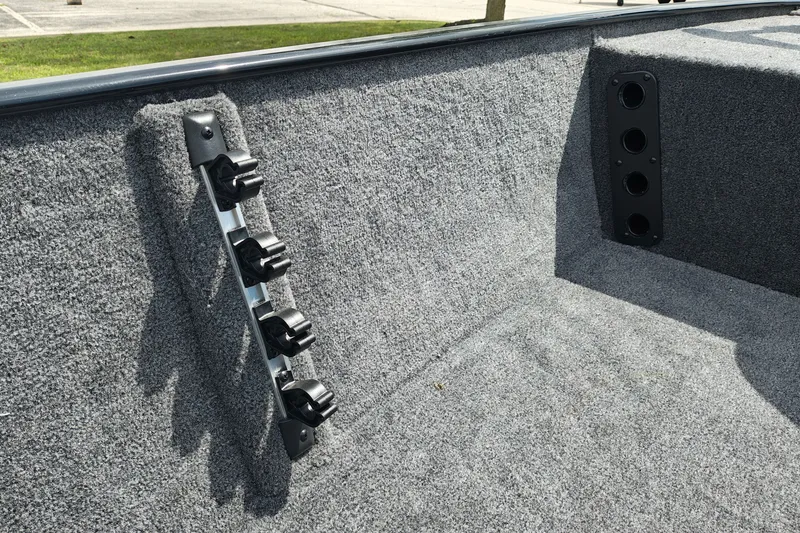 Slide: The Image of Interior of 2027 Tracker Bass Tracker Classic XL boat with rod holders. - 14