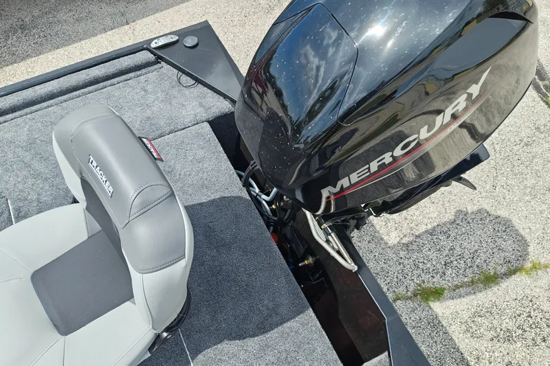 Slide: The Image of 2027 Tracker Bass Tracker Classic XL boat with Mercury engine and gray seating. - 23