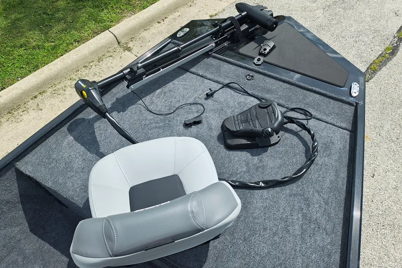 Slide: The Image of 2027 Tracker Bass Tracker Classic XL boat deck with seat and trolling motor. - 17