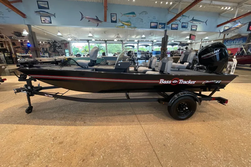The Image of 2027 Tracker Bass Tracker Classic XL boat in showroom, side view with Mercury engine. - 0