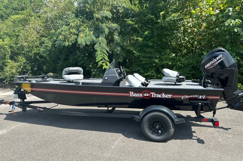 The Image of 2027 Tracker Bass Tracker Classic XL boat with Mercury engine on trailer. - 0