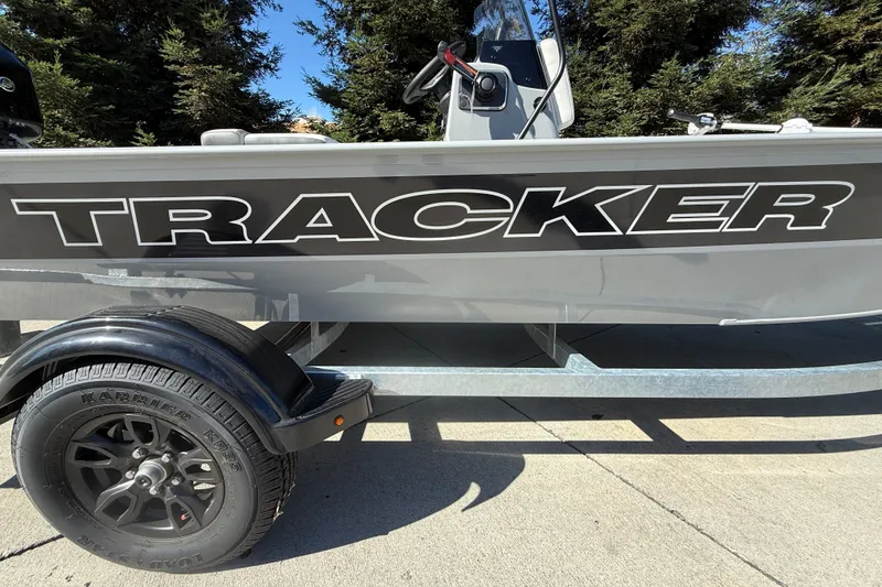Slide: The Image of 2027 Tracker Bass Tracker Classic CC boat on trailer, side view with logo. - 18