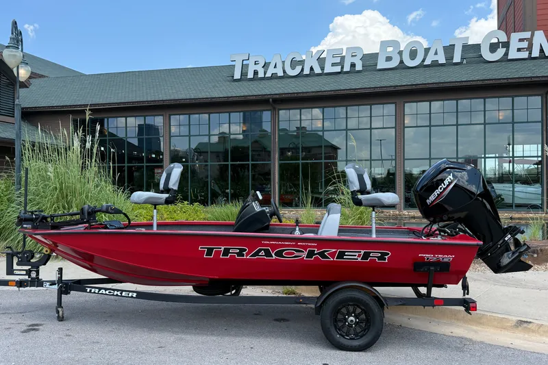 The Image of 2027 Tracker Pro Team 175 boat displayed outside Tracker Boat Center. - 0