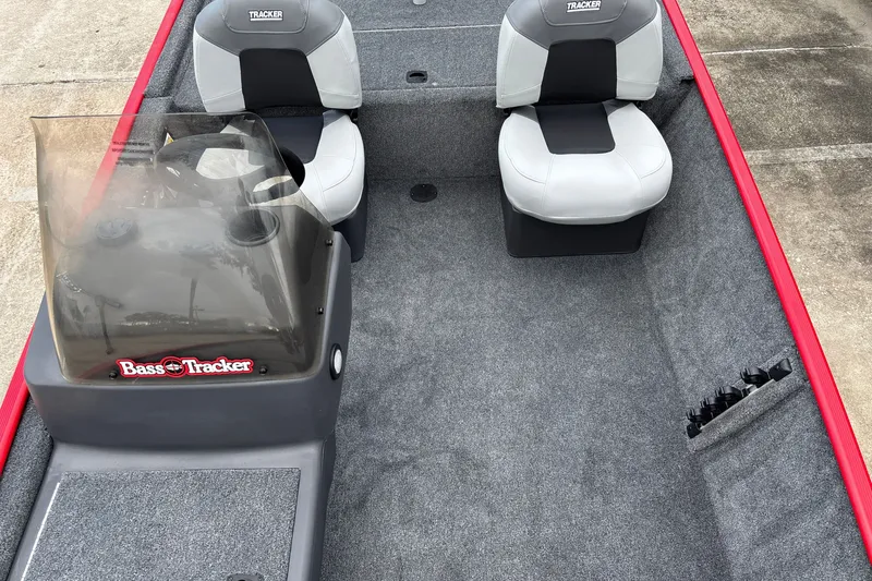 Slide: The Image of 2027 Tracker Bass Tracker Classic XL boat interior with dual seats and steering console. - 19
