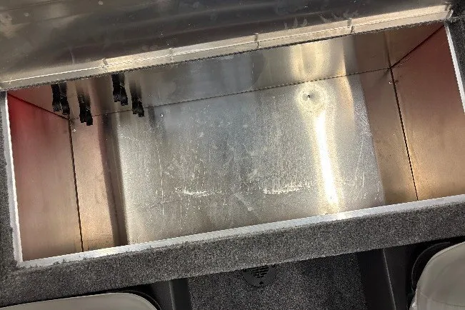 Slide: The Image of Interior storage compartment of 2027 Tracker Bass Tracker Classic XL boat. - 23