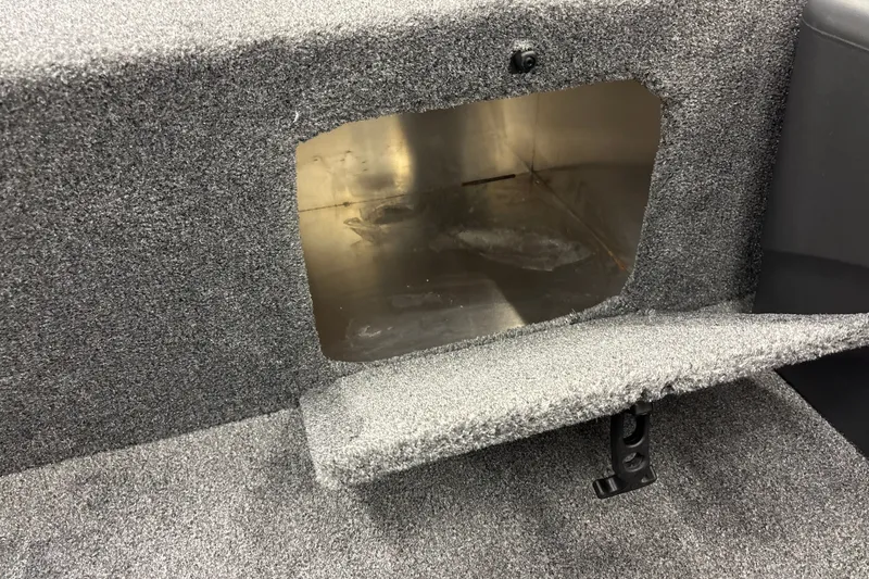 Slide: The Image of Carpeted storage compartment in 2027 Tracker Bass Tracker Classic XL boat. - 20