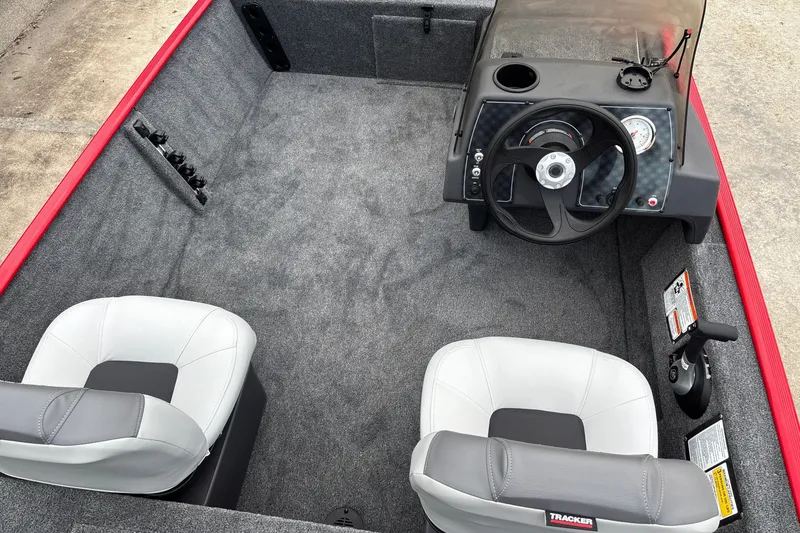 Slide: The Image of Interior of 2027 Tracker Bass Tracker Classic XL boat with steering console and seating. - 14
